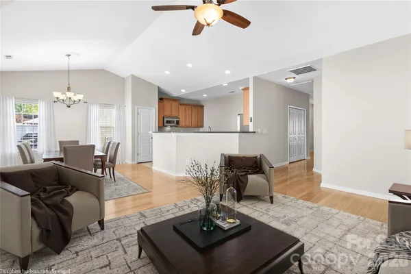a kitchen with a sink stainless steel appliances and cabinets