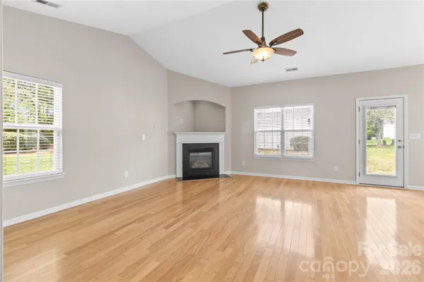 a living room with a fireplace