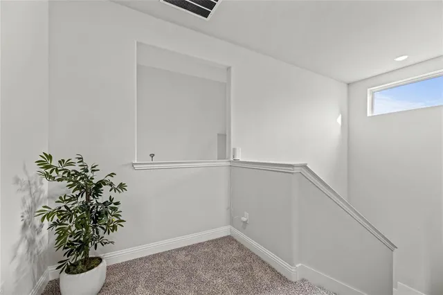 a bathroom with a sink vanity and a mirror