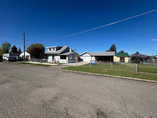 2422 Princeton Street Butte, MT 59701 - Photo 1 of 1 Bungalow-style house featuring a garage and concrete driveway