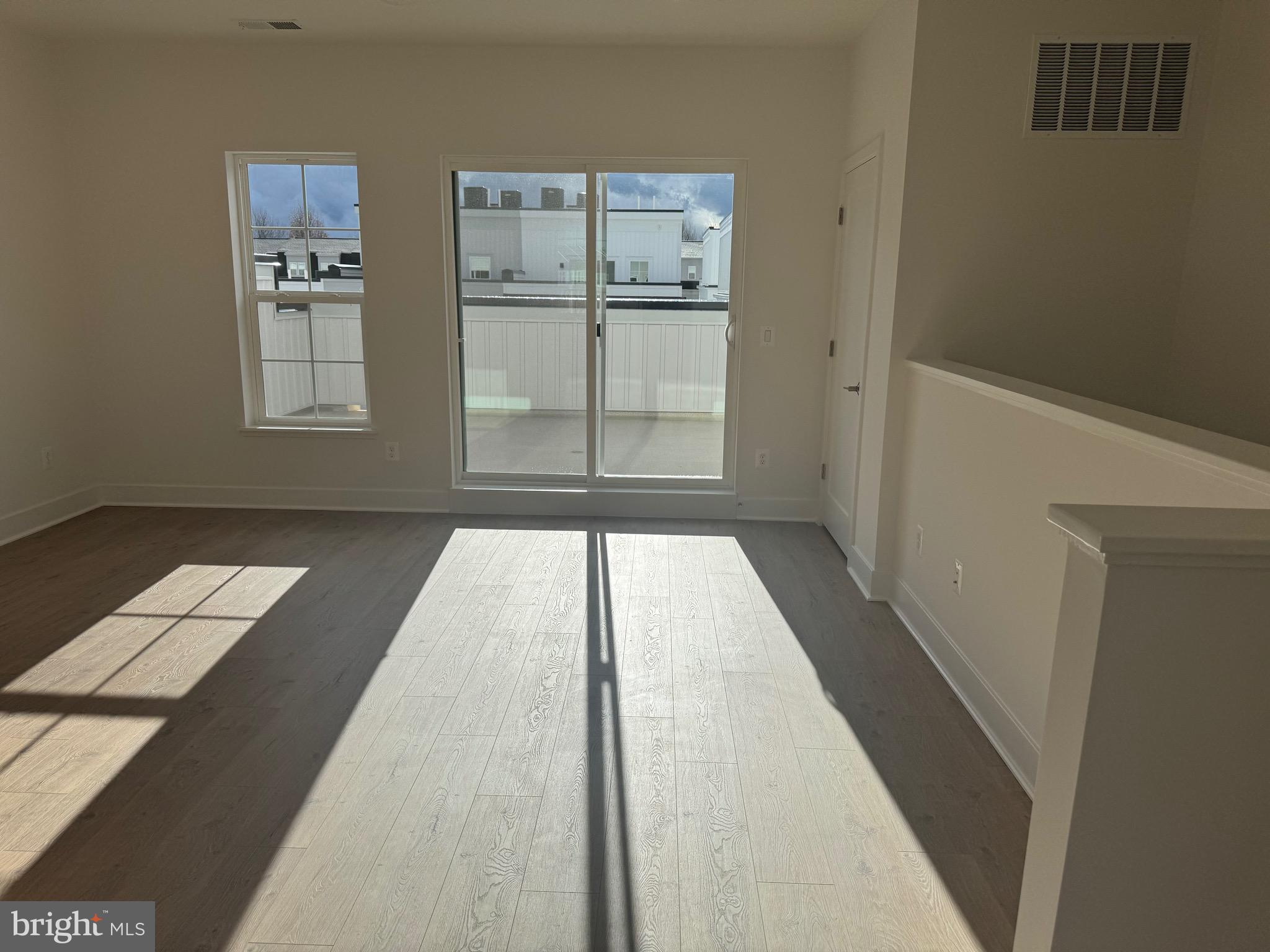 3509 Margaret Jones Place Gaithersburg, MD 20877 - Photo 25 of 40 Top floor family room leads to roof top terrace