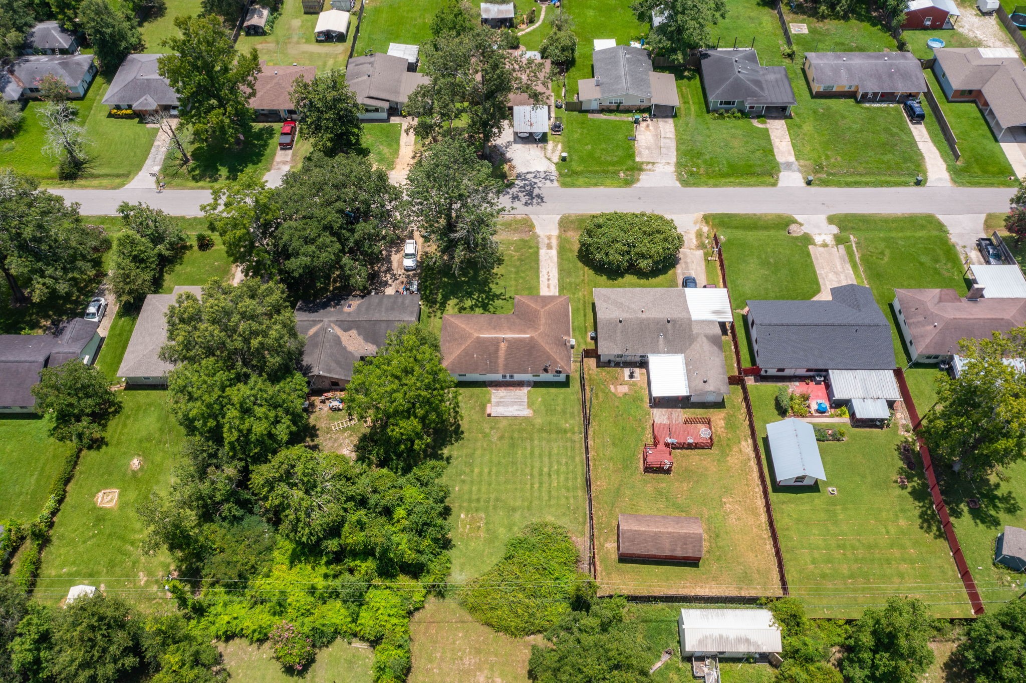 7280 Click Drive Beaumont, TX 77708 - Photo 32 of 39 an aerial view of residential houses with yard