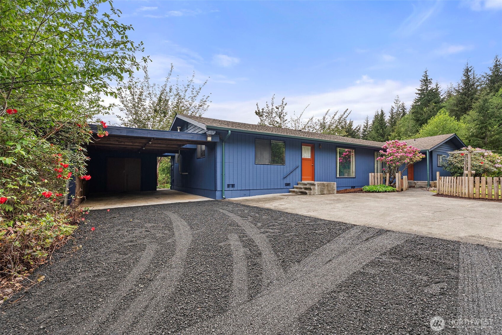 626 Ostman Road Raymond, WA 98577 - Photo 18 of 29 a front view of a house with a yard and a garage