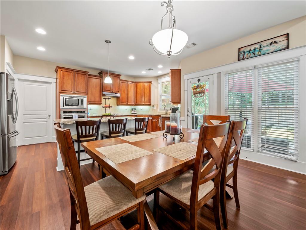 453 Hunter Street Northwest Norcross, GA 30071 - Photo 5 of 36 a view of a dining room with furniture window and wooden floor