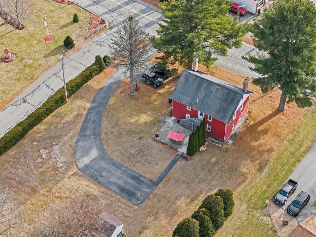 8 Mill Road Chelmsford, MA 01824 - Photo 34 of 39 an aerial view of a house with a yard