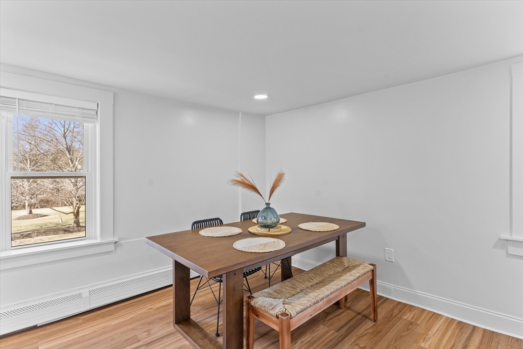 8 Mill Road Chelmsford, MA 01824 - Photo 8 of 39 a view of a workspace with furniture and wooden floor
