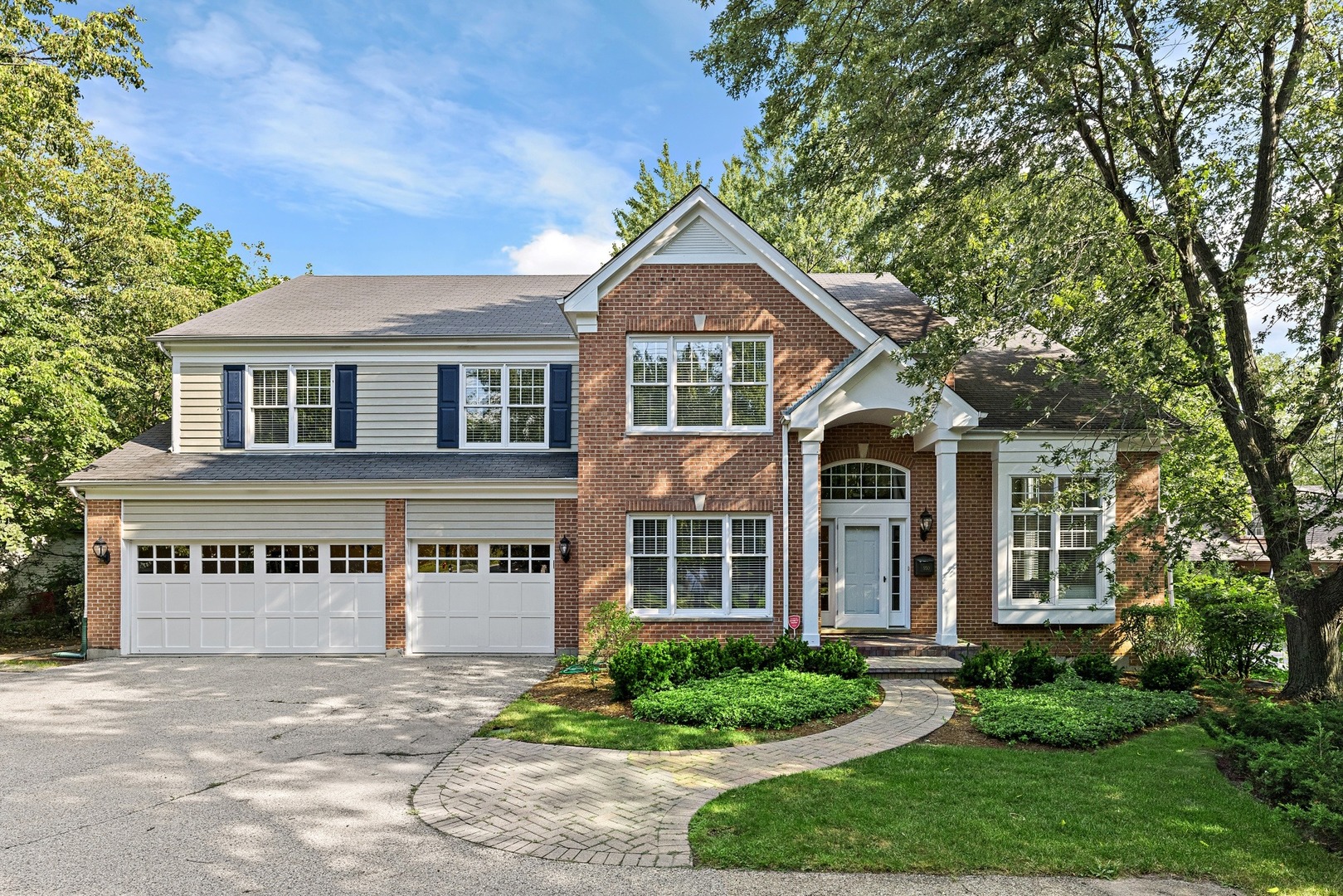 950 Shermer Road Northbrook, IL 60062 - Photo 1 of 32 front view of a house with a yard