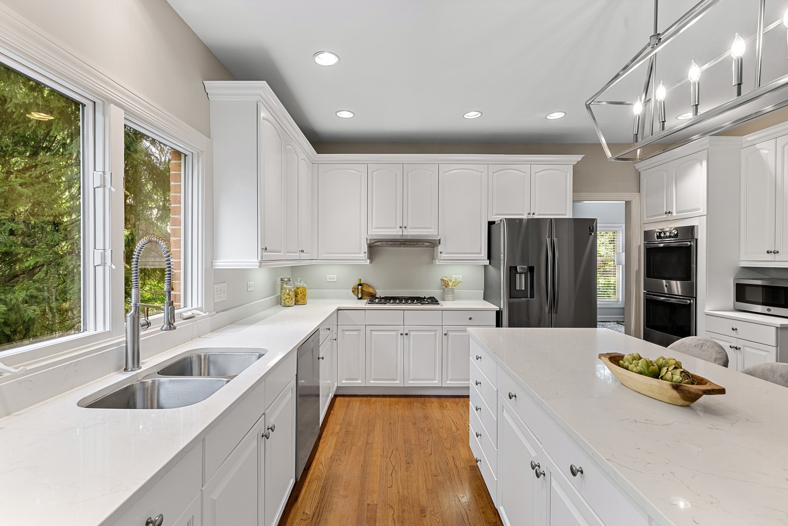 950 Shermer Road Northbrook, IL 60062 - Photo 9 of 32 a large kitchen with a large window and stainless steel appliances