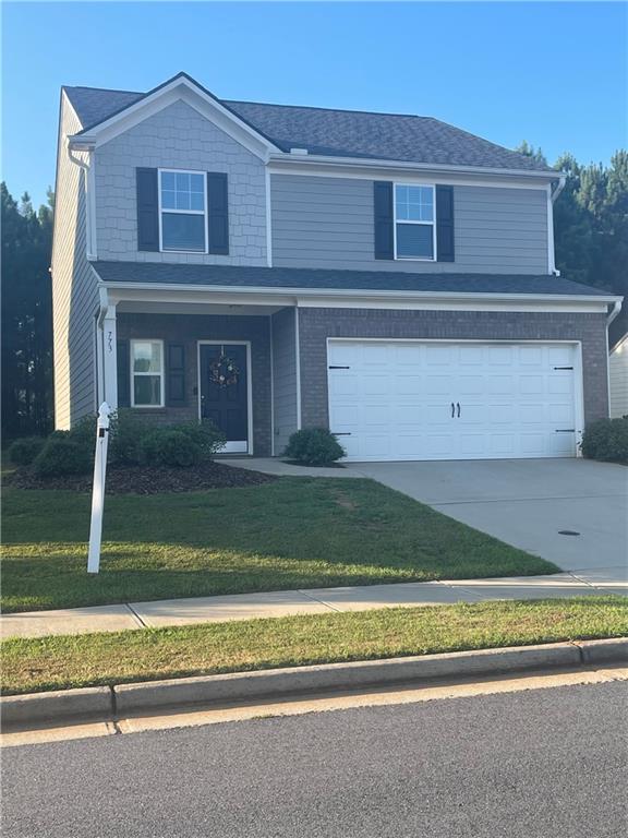 a view of a house with a swimming pool
