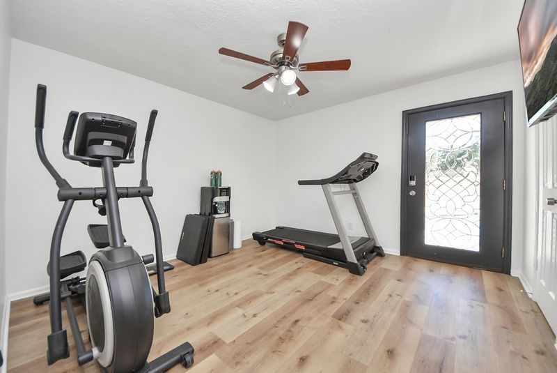 155 Springs Edge Drive Conroe, TX 77356 - Photo 20 of 49 a view of a room with gym equipment