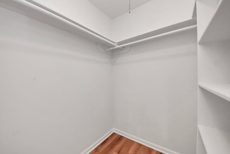 155 Springs Edge Drive Conroe, TX 77356 - Photo 30 of 49 a view of a room with shelf on the wall