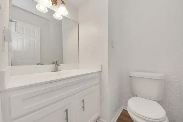 a bathroom with a sink and mirror