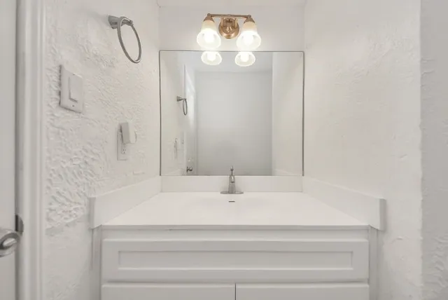 a view of a backyard with sitting area