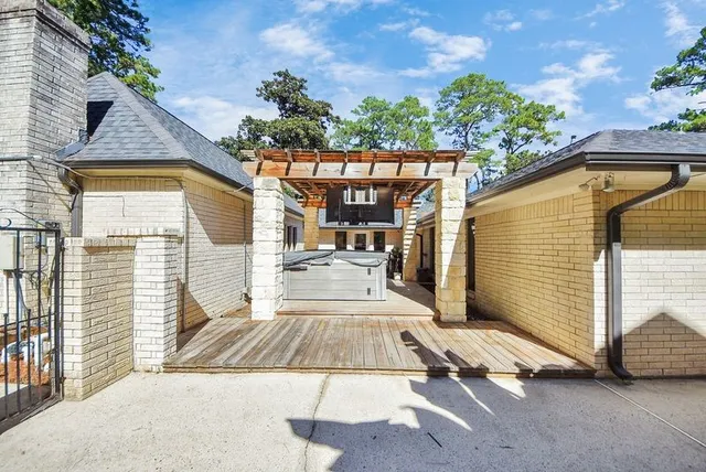 a view of living room with furniture and floor to ceiling window
