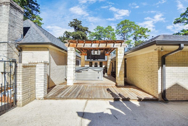 155 Springs Edge Drive Conroe, TX 77356 - Photo 37 of 49 a view of a backyard with sitting area