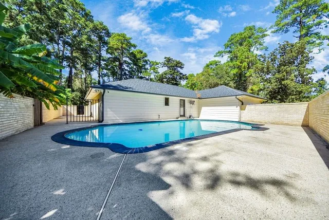 a backyard of a house with trees