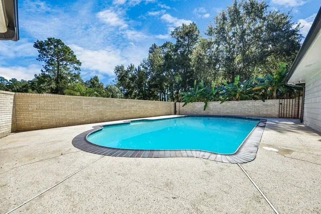 a view of a yard with an outdoor space