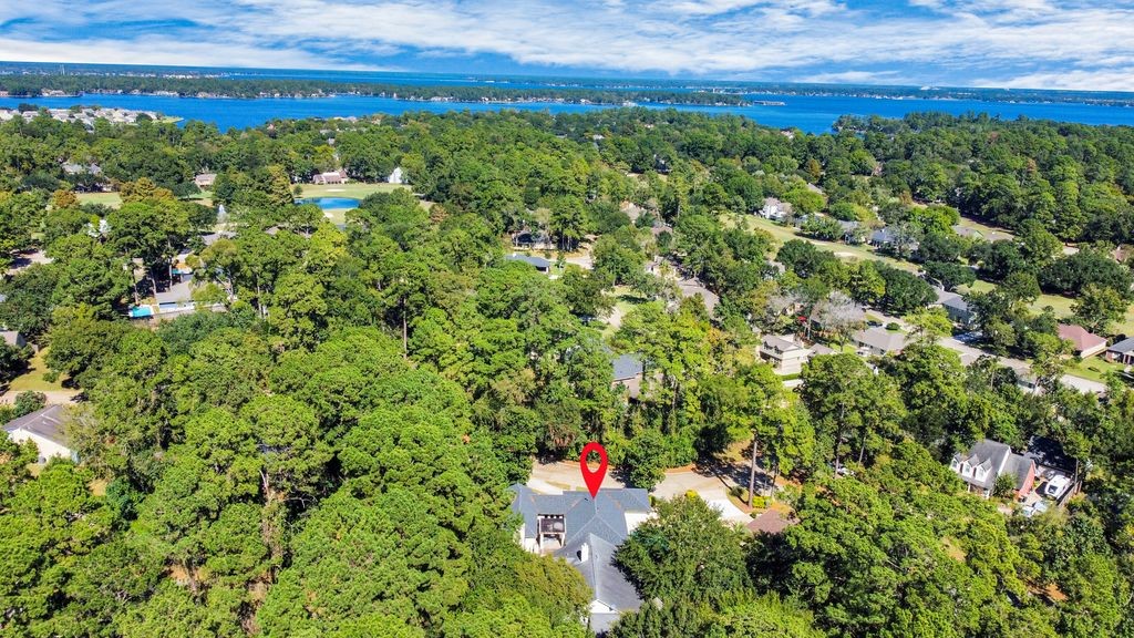 155 Springs Edge Drive Conroe, TX 77356 - Photo 47 of 49 a view of a yard with an outdoor space