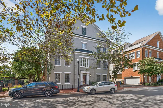 a building with trees in front of it