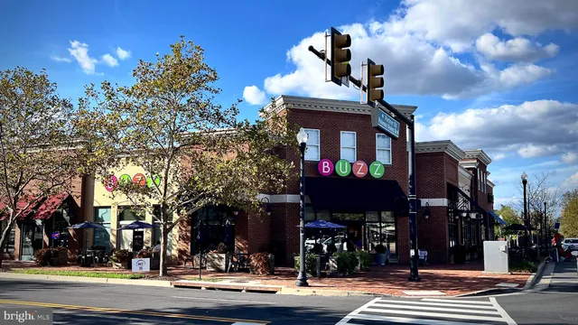 a view of street with sitting area