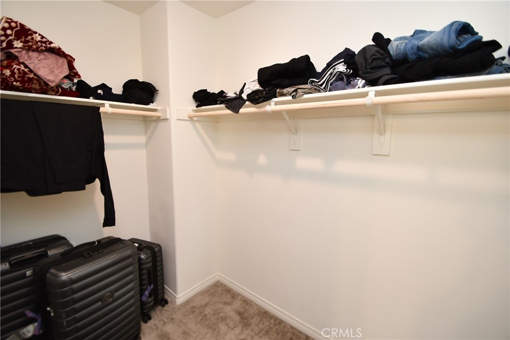 5367 Heitz Way Fontana, CA 92336 - Photo 26 of 50 a close view of shoes stand in kitchen