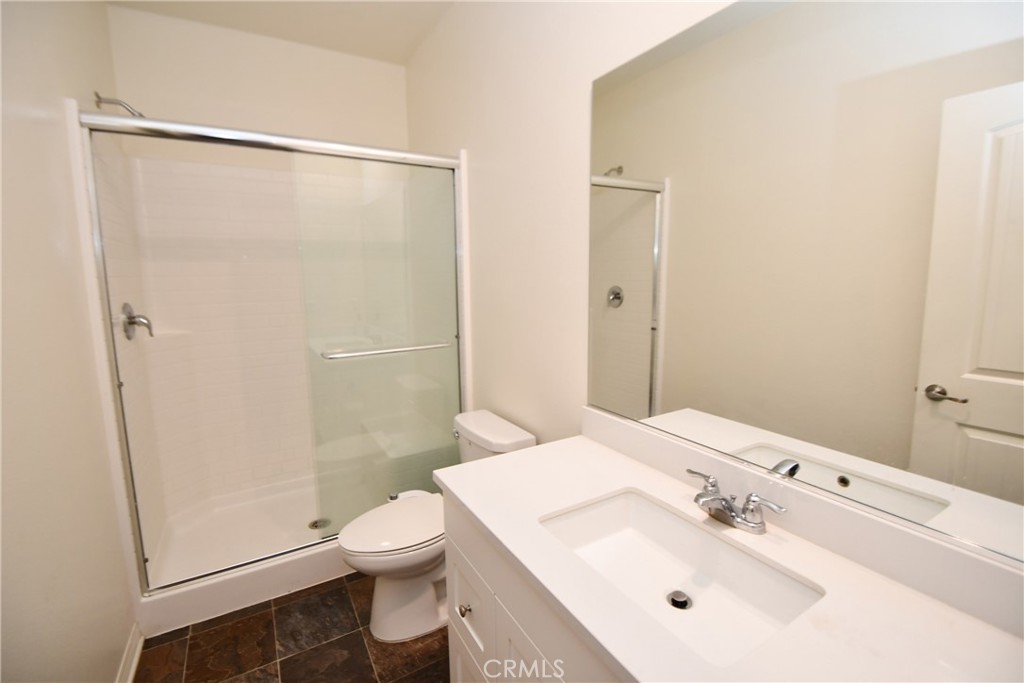5367 Heitz Way Fontana, CA 92336 - Photo 33 of 50 a bathroom with a sink toilet and shower