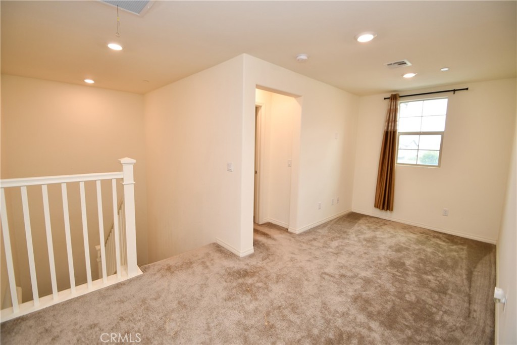 5367 Heitz Way Fontana, CA 92336 - Photo 39 of 50 a view of an empty room with a window