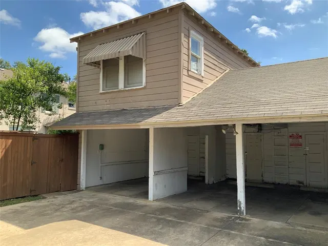 a view of a house with a garage