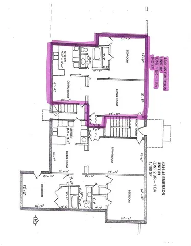 a black and white photo of a living room