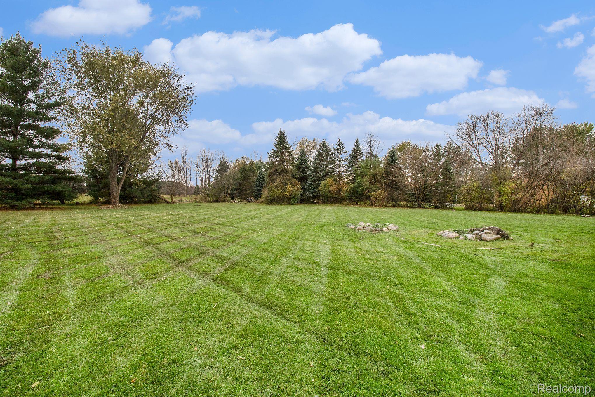 10330 East Potter Road Davison, MI 48423 - Photo 39 of 45 Fire Pit Perfect for Gatherings