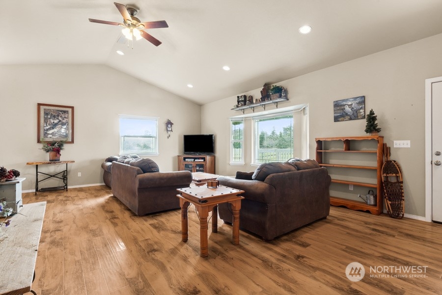 9422 Gastaeson Lane Southwest Rochester, WA 98579 - Photo 14 of 35 a living room with furniture window and wooden floor