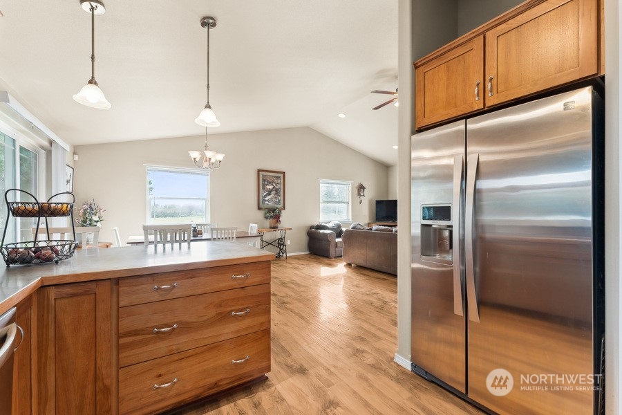 9422 Gastaeson Lane Southwest Rochester, WA 98579 - Photo 20 of 35 a kitchen with counter top space and stainless steel appliances