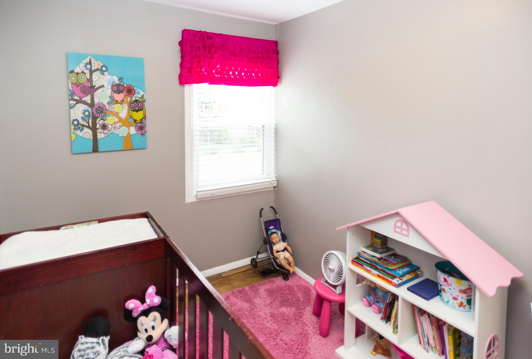 2703 Yarnall Road Halethorpe, MD 21227 - Photo 14 of 28 a room with toys and a book shelf