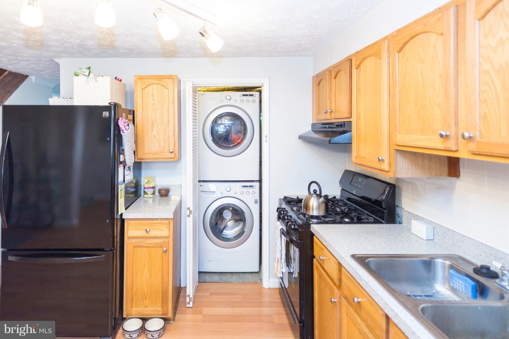 2703 Yarnall Road Halethorpe, MD 21227 - Photo 20 of 28 a utility room with sink dryer and washer
