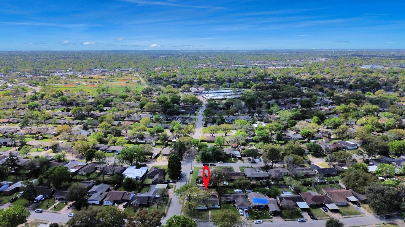 6701 Neff Street Houston, TX 77074 - Photo 43 of 44 Aerial view of the property showing corner lot location, surrounding homes, and mature tree coverage.