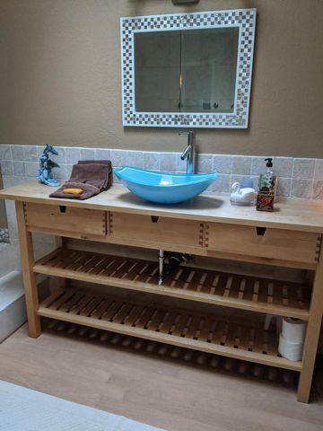 100 Cape Pointe Circle Jupiter, FL 33477 - Photo 11 of 25 a bathroom with a sink and a stove