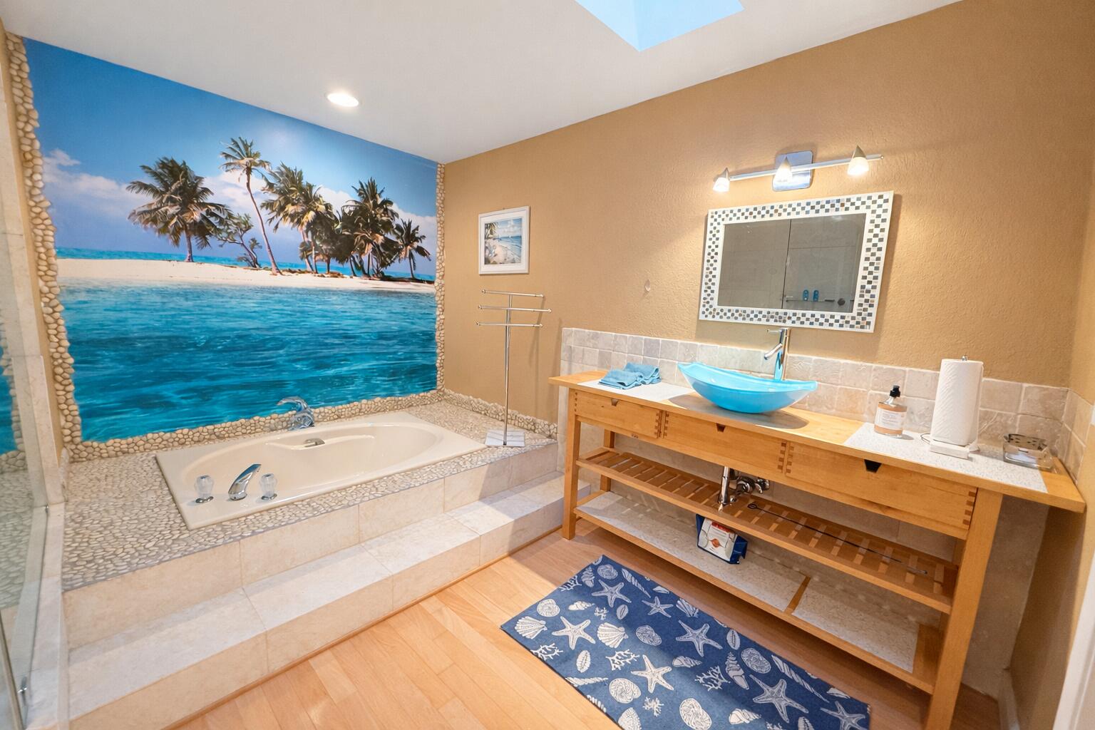 100 Cape Pointe Circle Jupiter, FL 33477 - Photo 15 of 33 a bathroom with a tub a sink and a mirror