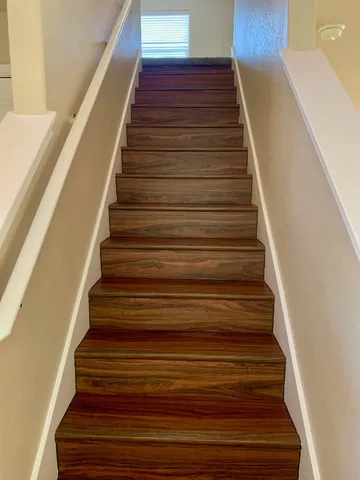 a view of a house that has a garden