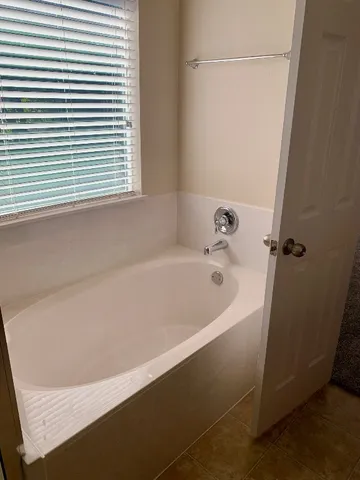 a bathroom with a bathtub