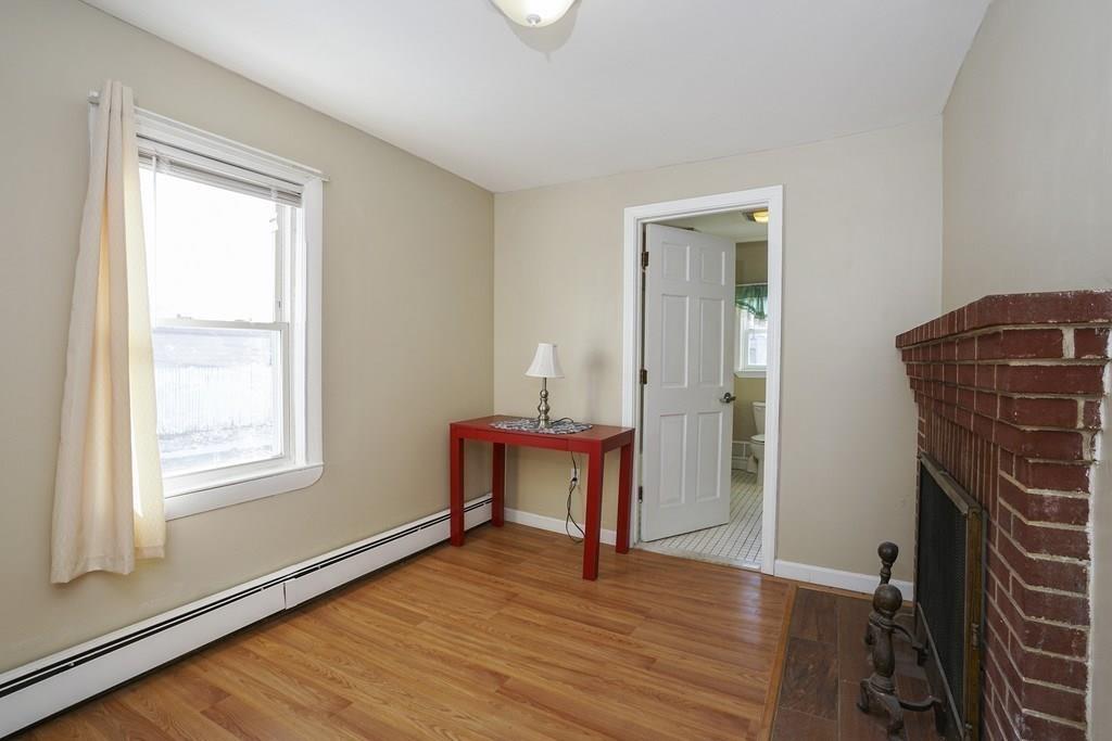 1309 Washington Street Canton, MA 02021 - Photo 17 of 35 a view of a livingroom with furniture and window