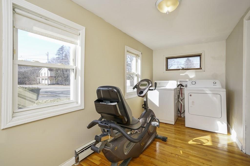 1309 Washington Street Canton, MA 02021 - Photo 18 of 35 a view of a workspace with furniture and a window