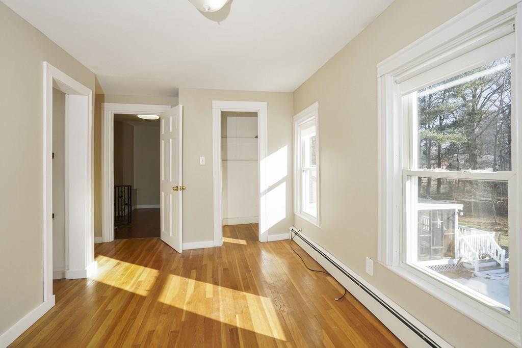 1309 Washington Street Canton, MA 02021 - Photo 21 of 35 a view of a room with wooden floor and a balcony