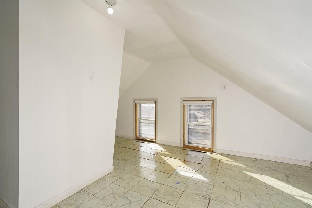 1309 Washington Street Canton, MA 02021 - Photo 26 of 35 an empty room with windows and closet