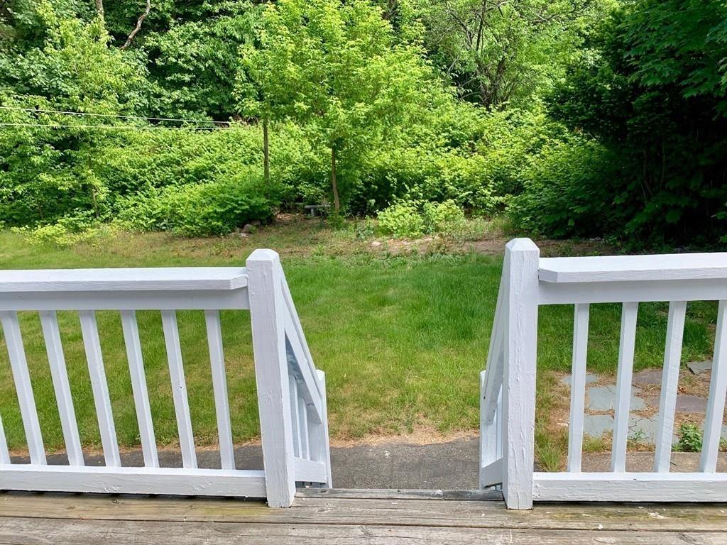 1309 Washington Street Canton, MA 02021 - Photo 28 of 35 a porch with a yard