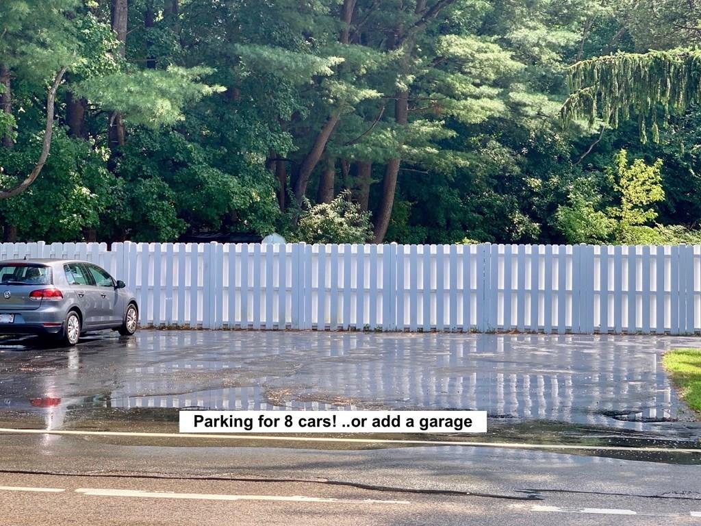 1309 Washington Street Canton, MA 02021 - Photo 3 of 35 a view of a street with a car parked on the road