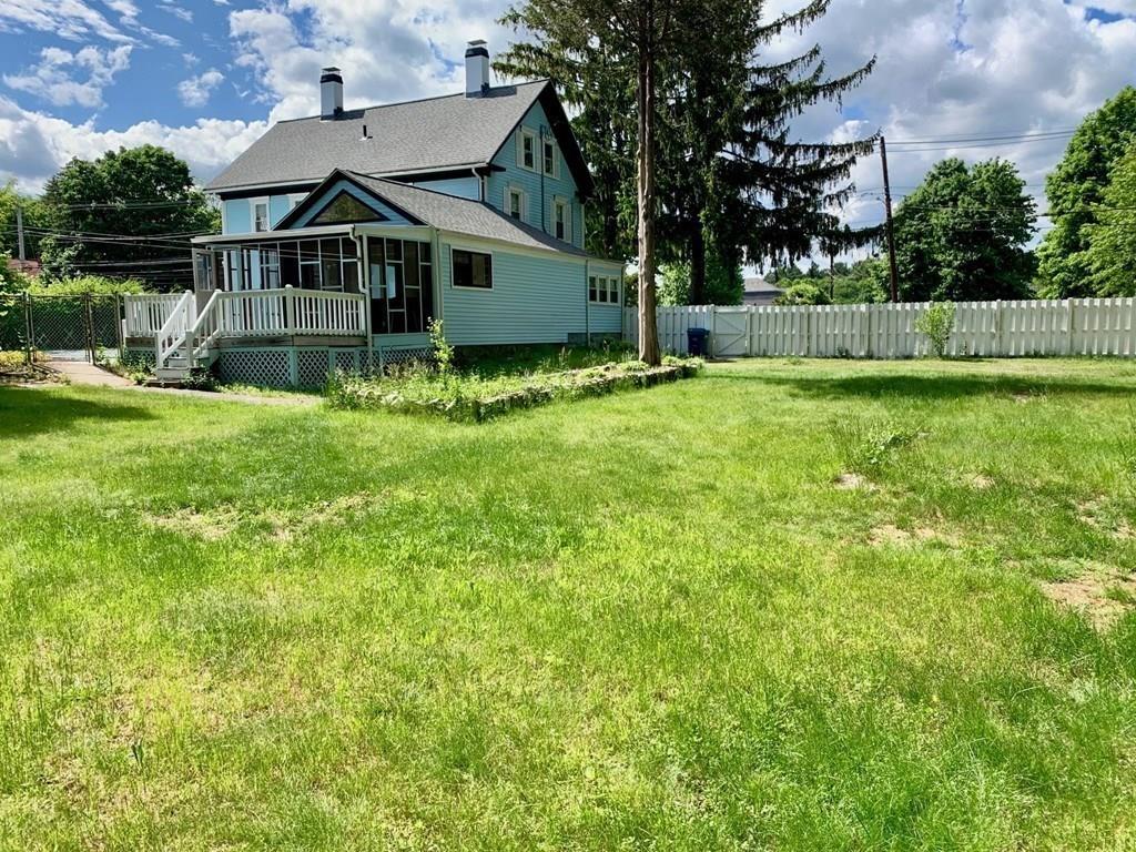 1309 Washington Street Canton, MA 02021 - Photo 31 of 35 a front view of a house with a yard