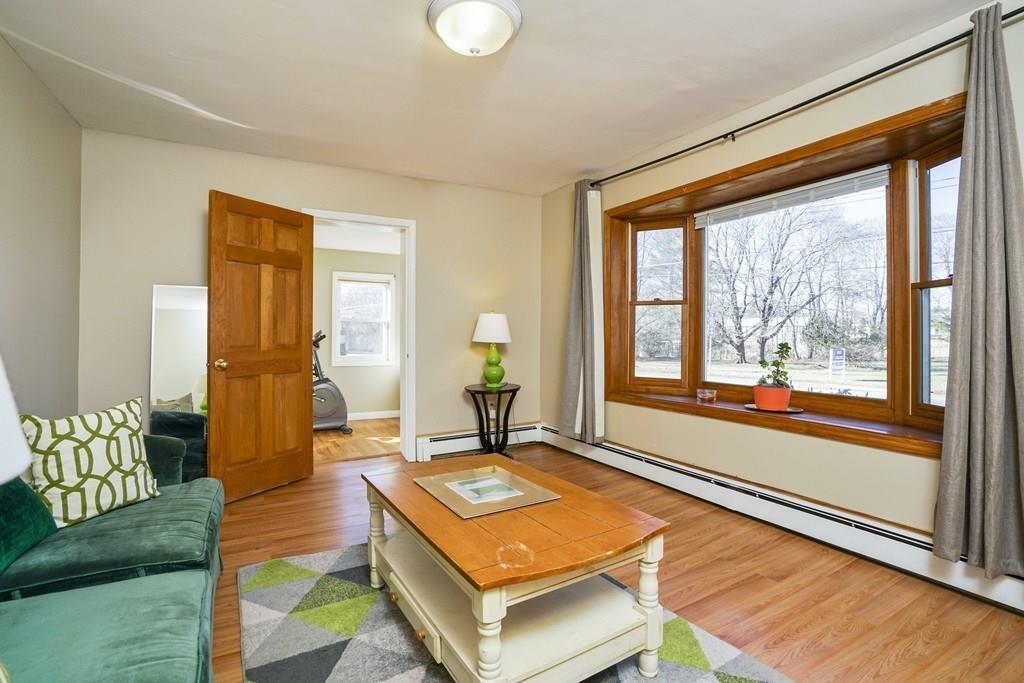 1309 Washington Street Canton, MA 02021 - Photo 4 of 35 a living room with a large window