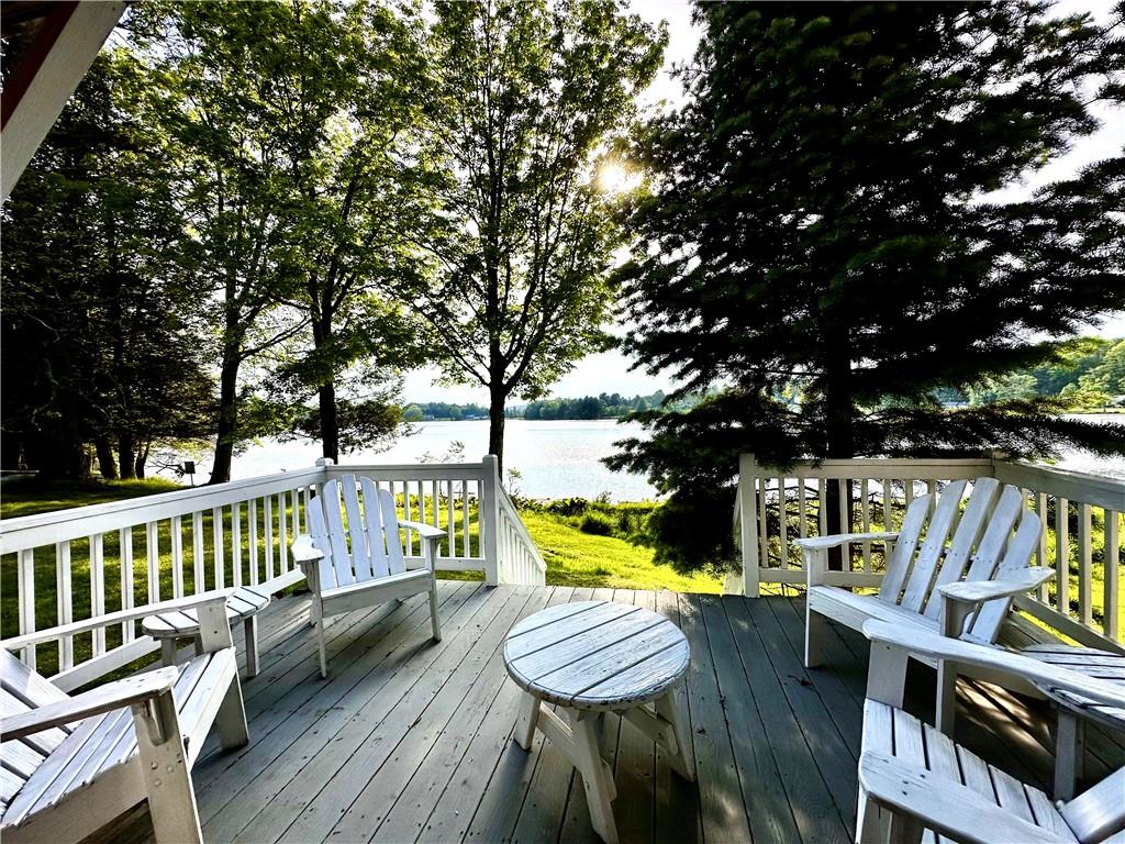Wooden terrace featuring a water view