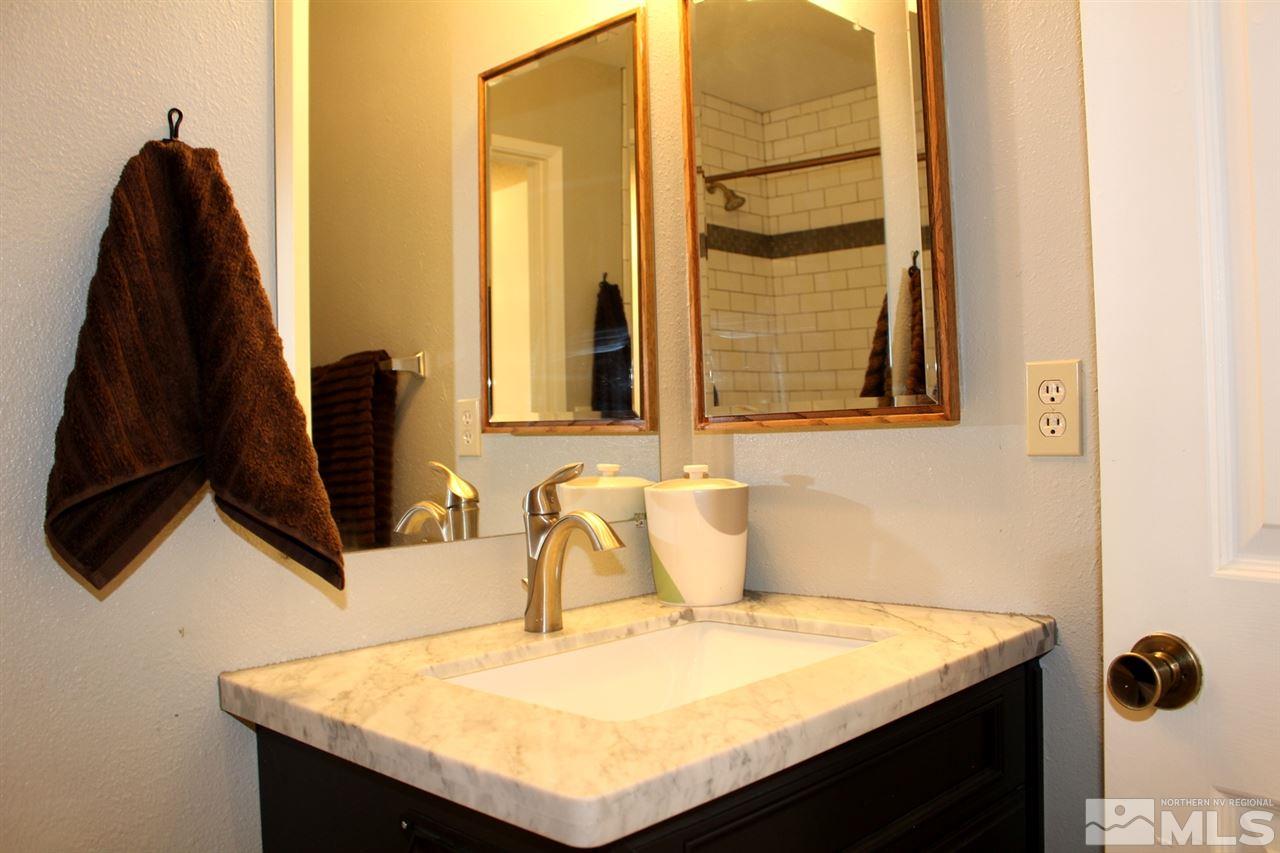 3824 Bexley Square Reno, NV 89503 - Photo 18 of 25 a bathroom with a sink and a mirror