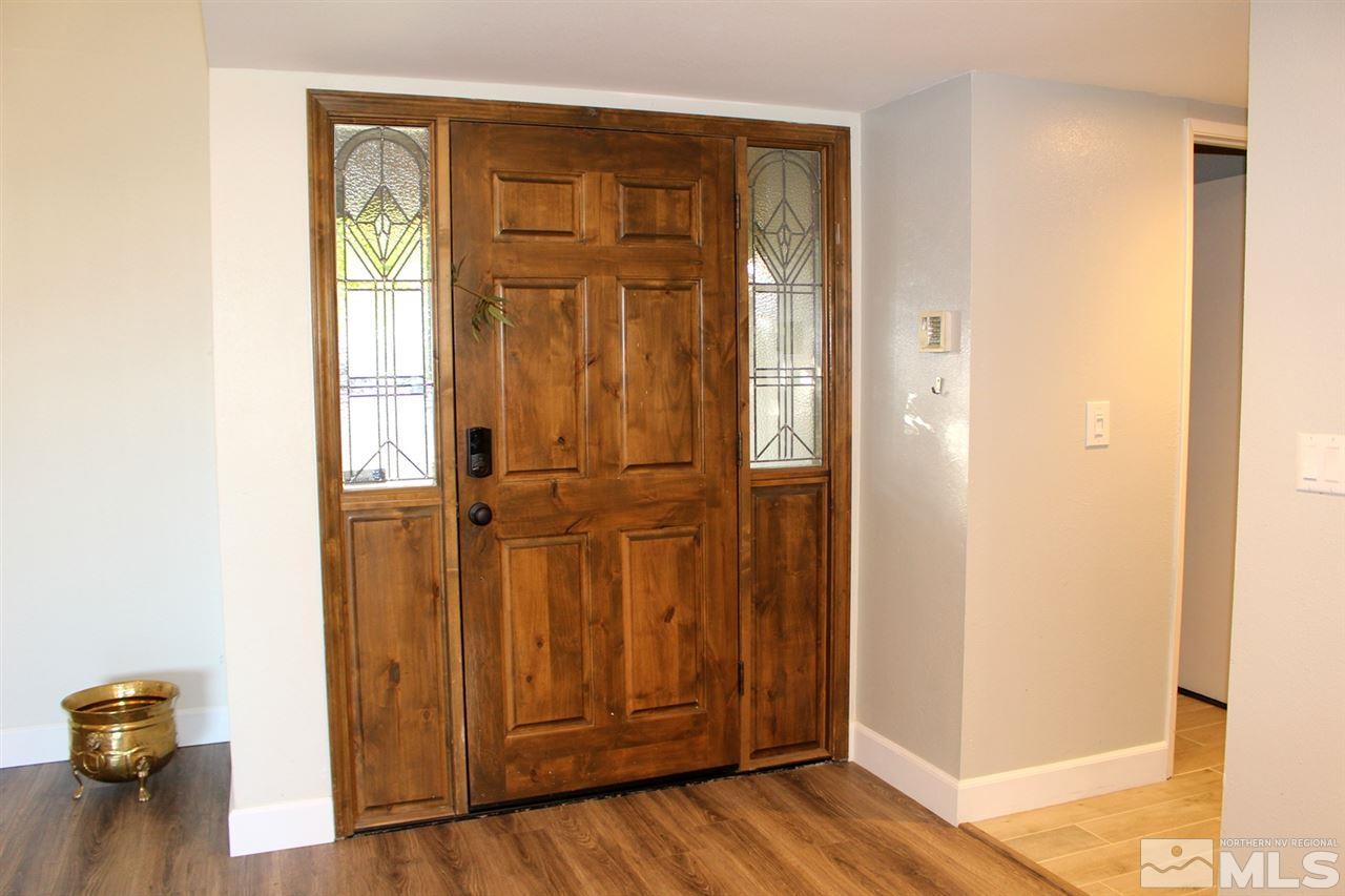 3824 Bexley Square Reno, NV 89503 - Photo 10 of 25 a view of a hallway with wooden floor